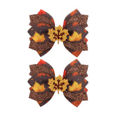 Yanjie maple glitter leaf bow clip adds shimmering fall detail.