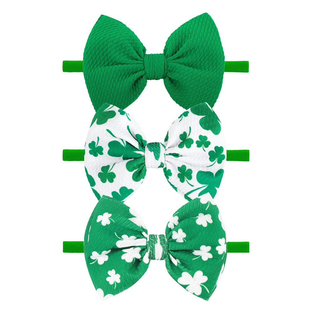 YanJie St Patrick headband with clover for festive photos.
