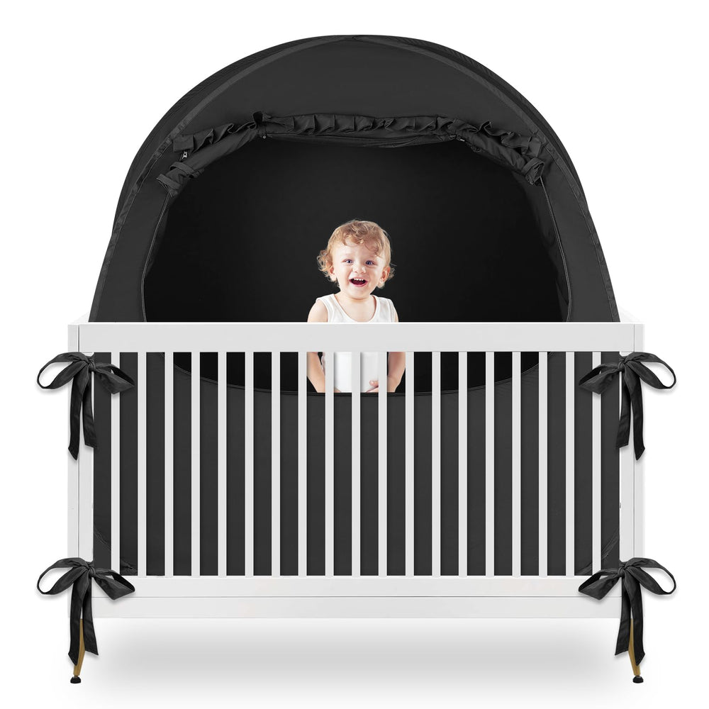 YAVIL blackout crib tent assembled for peaceful daytime naps and pet-free crib space.