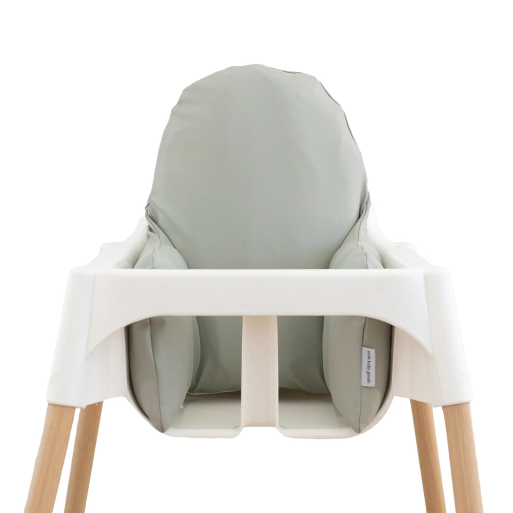 Yeah Baby Goods wipeable Antilop highchair cover in sage for quick cleanup after meals.
