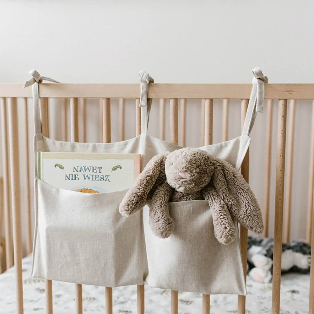 YeeMan linen baby bedside bag on crib front view with two pockets for easy reach