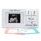 YelloIris white ultrasound frame milestone display for growing baby memories