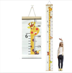 Yellow giraffe growth chart on wall for kids' height tracking.