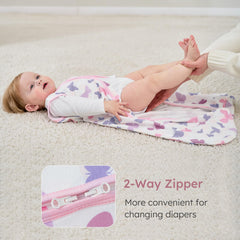 Two-way zipper with interior guard protects baby's skin during changes