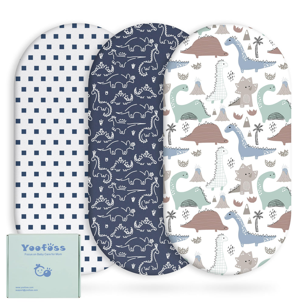 Yoofoss bassinet sheets in dark blue dinosaurs provide a soft, breathable surface for baby comfort.