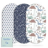 Yoofoss bassinet sheets in dark blue dinosaurs provide a soft, breathable surface for baby comfort.