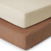 Yoofoss muslin crib sheets apricot and brown two-pack on mattress for soft, breathable sleep