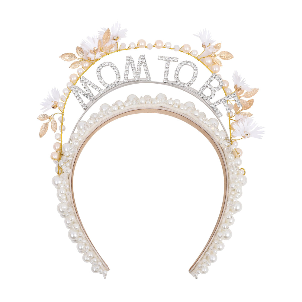 YOUAME pearl-embellished mom-to-be headband close-up with fabric flower and gold accents