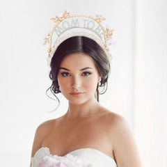YOUAME pearl headband worn by mum-to-be at celebrations