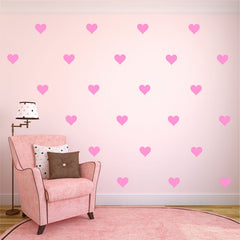 Removable 108-piece heart wall decals in soft pink for smooth surfaces.