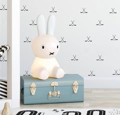 Black hockey stick decals provide removable decor without wall damage