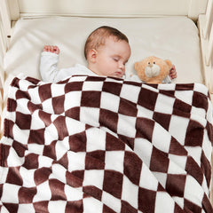 Yurhap baby blanket in stroller scene emphasizes travel-friendly warmth and easy care.