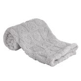 Yurhap fleece baby blanket with heart checkered pattern provides warm comfort.