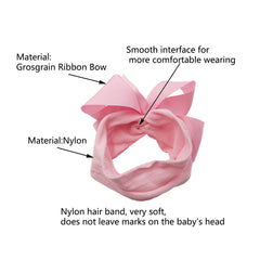 Yxiang gray bow headband keeps hair tucked softly on tiny heads.
