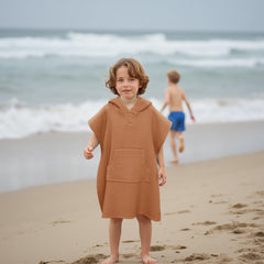 Kids at the beach wearing Zamlory hooded towel cover-up