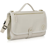 Zaveena portable diaper changing pad in cream exterior for stylish on-the-go changes.