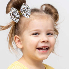 ZCYYYS baby leopard bow clip suits toddler hairstyles and outfits.