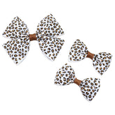 ZCYYYS leopard bow clip for women adds chic detail to daily hairstyles.