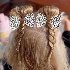 ZCYYYS leopard print bowknot clip adds playful flair for kids.