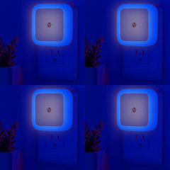 ZEZHOU 4-pack blue plug-in night lights glow softly, guiding steps at night.
