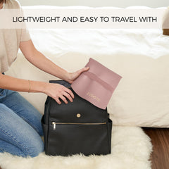 ZICOTO changing pad unfolded on a clean surface for diaper changes