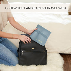 ZICOTO changing pad wipeable surface, easy cleanup after spills during travel.