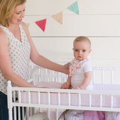 Ziggy Baby changing pad cover white dots pattern keeps baby comfortable during changes.
