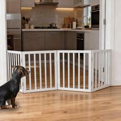 ZJSF freestanding dog gate folded for easy storage.