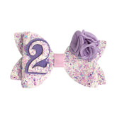 Zlwse birthday bow in purple rose with glitter for adorable toddler outfits.