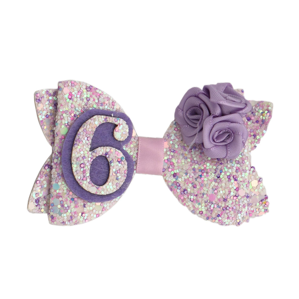 Zlwse sixth birthday hair bow with purple glitter adds sparkle to her party outfit