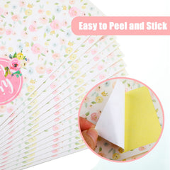 Zonon peel-and-stick labels on pink floral bottle, quick festive decoration.