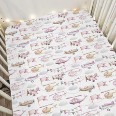 ZoUbqchY watercolor pink airplanes crib sheet adds cozy bedtime ambiance.