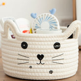 Zopeal cat basket with ear handles and cat-face design for stylish storage.