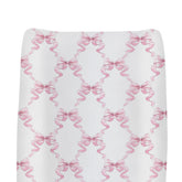 ZoUbqchY Pink Bows changing pad cover, soft pastel pink fabric ideal for diaper changes.