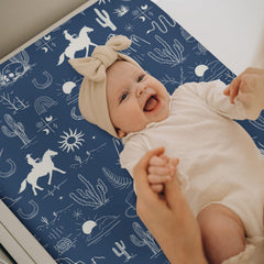 Zoubqchy cover featuring cattle skull motif enhances rustic nursery styling.