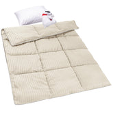 ZPECC toddler down-alternative comforter in cream stripe resting softly in a crib