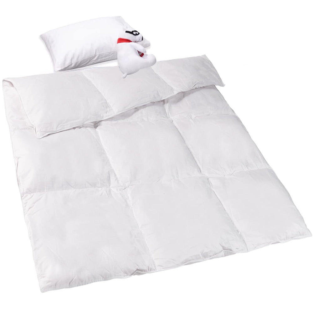ZPECC toddler goose down comforter in crib scene promotes cozy, safe sleep.