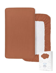 ZURLEFY 52x28 rust muslin crib sheet on a standard mattress for safe sleep.
