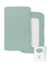 ZURLEFY light blue bassinet sheet folded, soft muslin fabric for delicate baby skin.