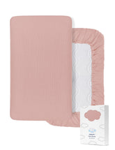 ZURLEFY pink muslin crib sheet fits standard cribs with soft, breathable cotton.