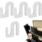 Zynoro chair-back hook on Stokke Tripp Trapp with four white clips for small items.