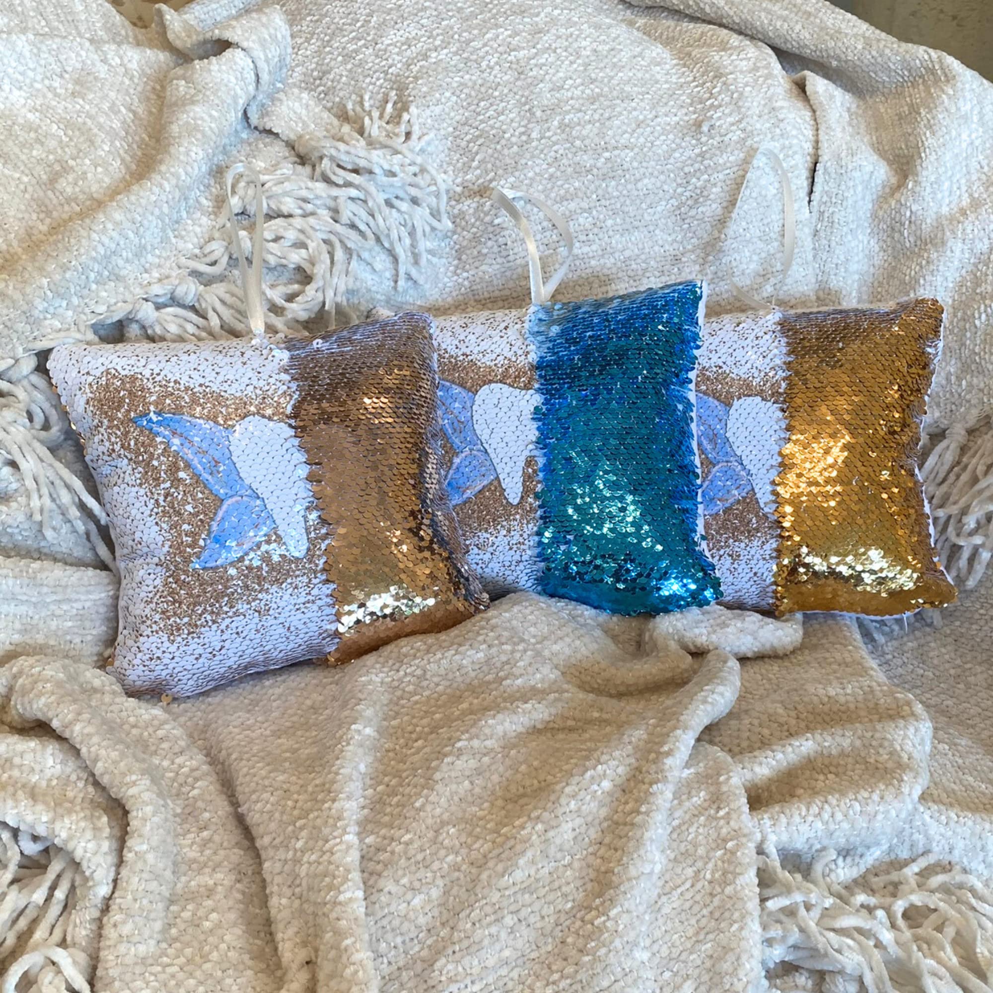 20 Moments of Tooth pillow measures 8x8 inches for small hands.