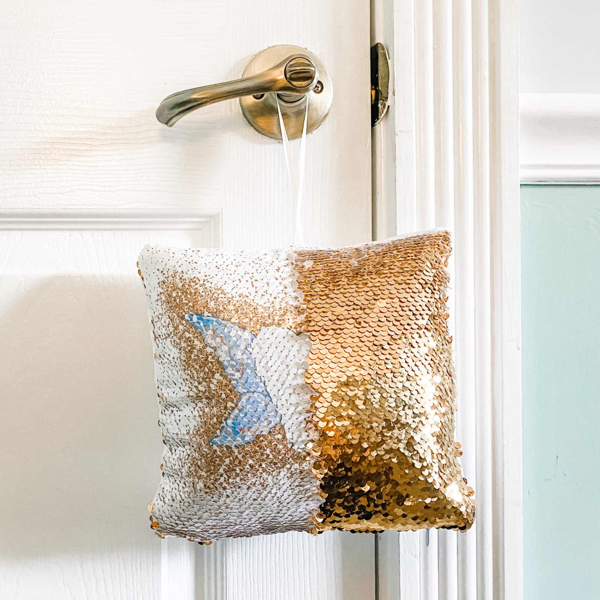 20 Moments of Tooth pillow has a hanging loop for easy display.