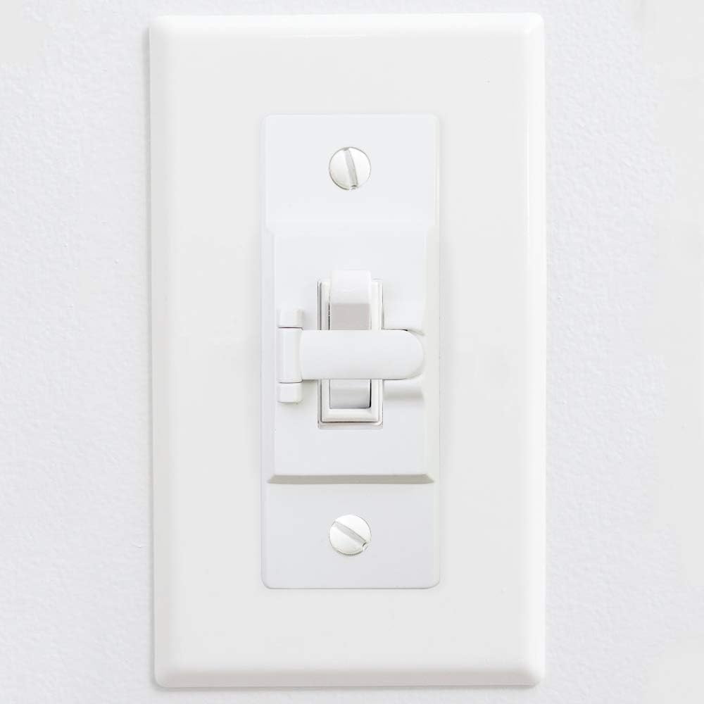 2FY2SW guard installation on a standard wall switch plate