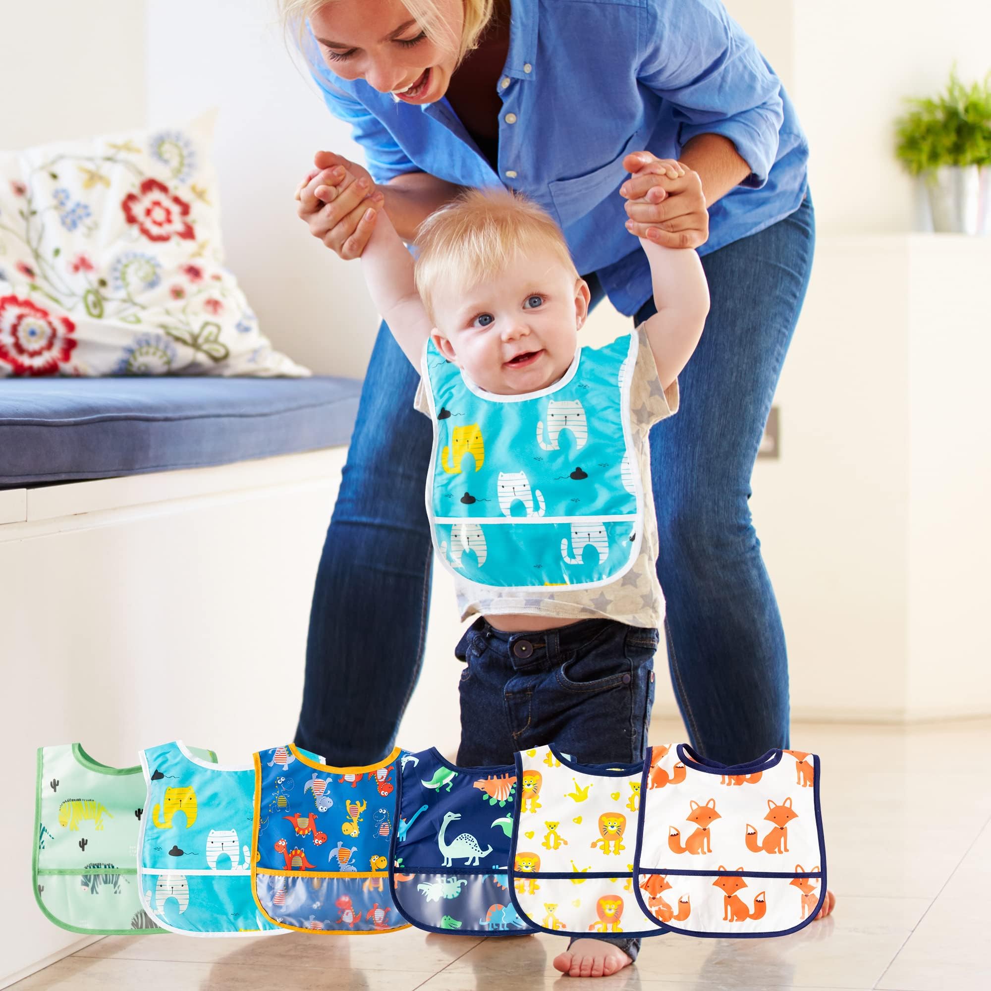 2ooya bibs crumb pocket feature; keeps mess contained.