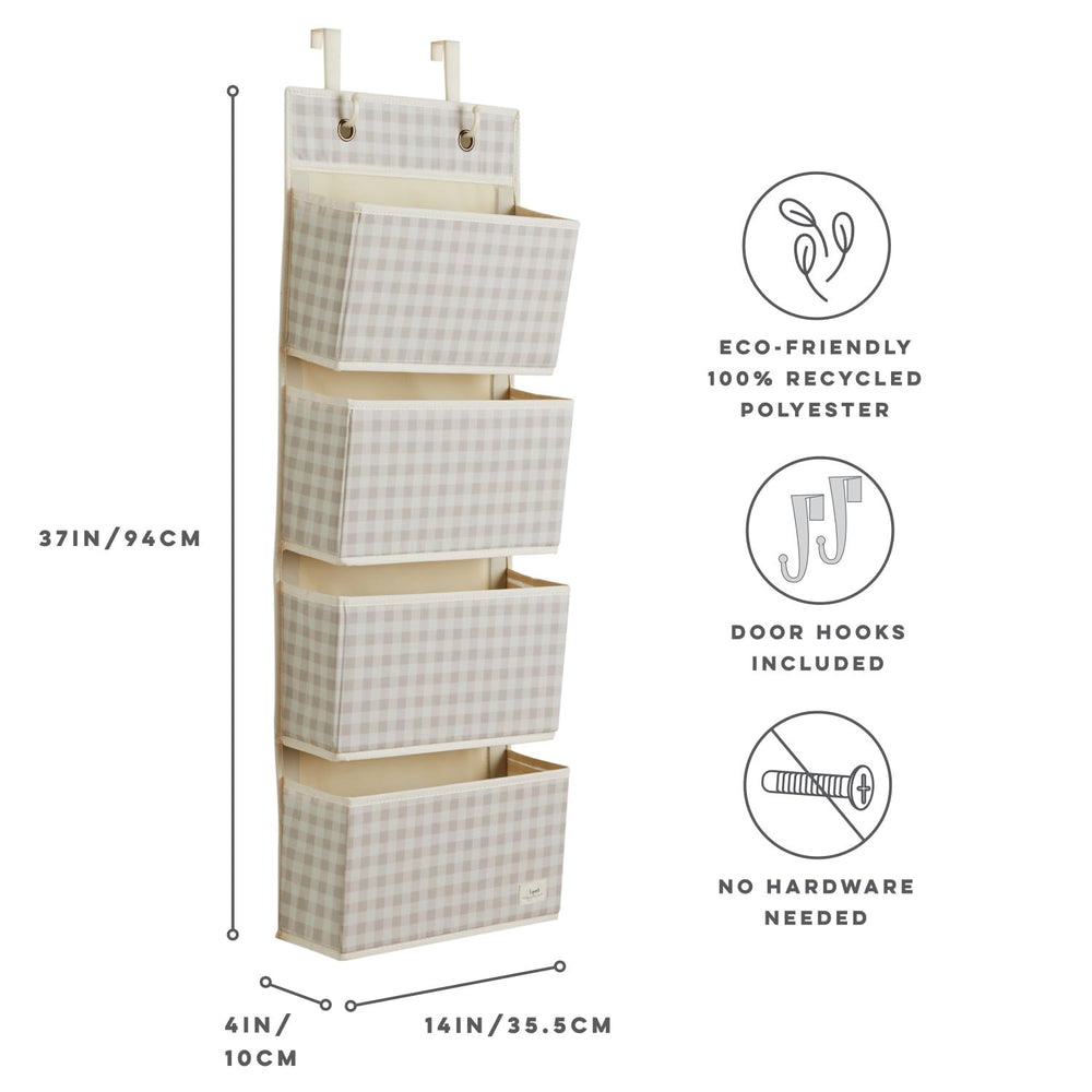 3 Sprouts four-pocket over-door storage in nursery setting.
