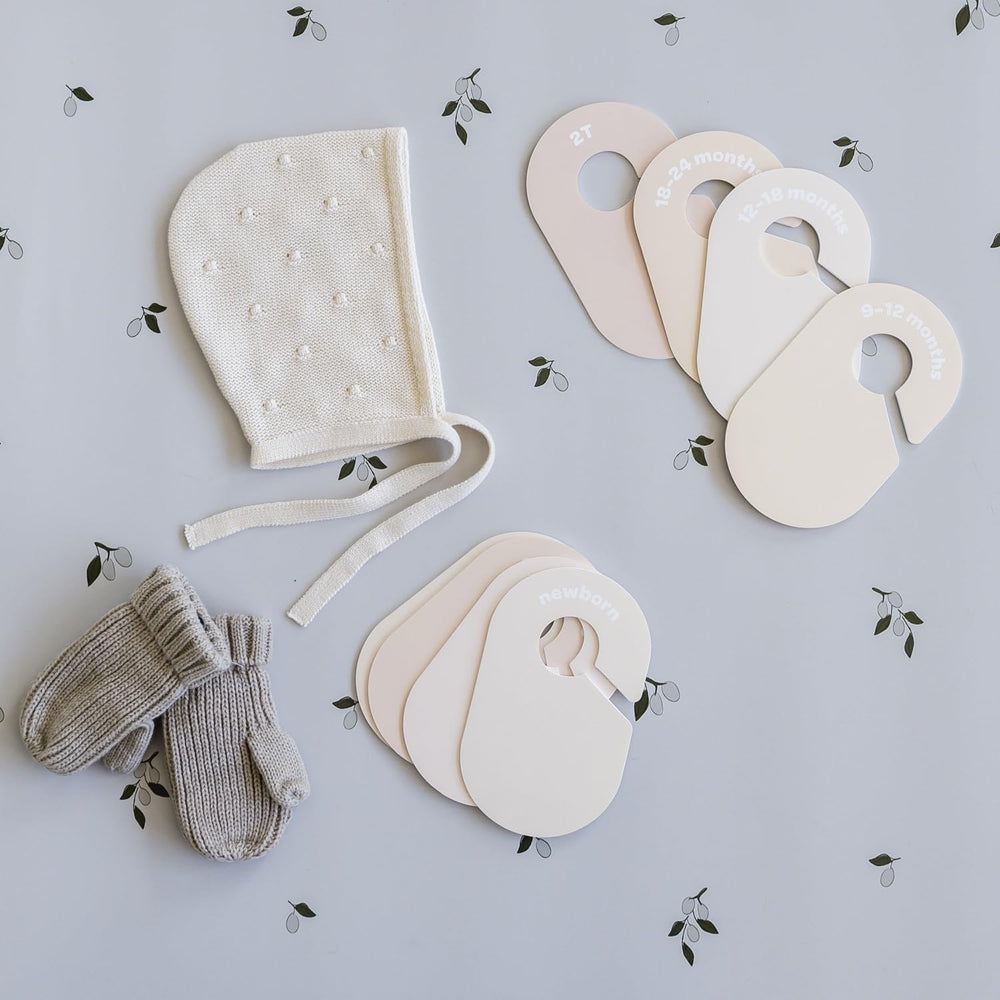 Plan growth with 3 Sprouts divider set as baby clothing changes sizes.