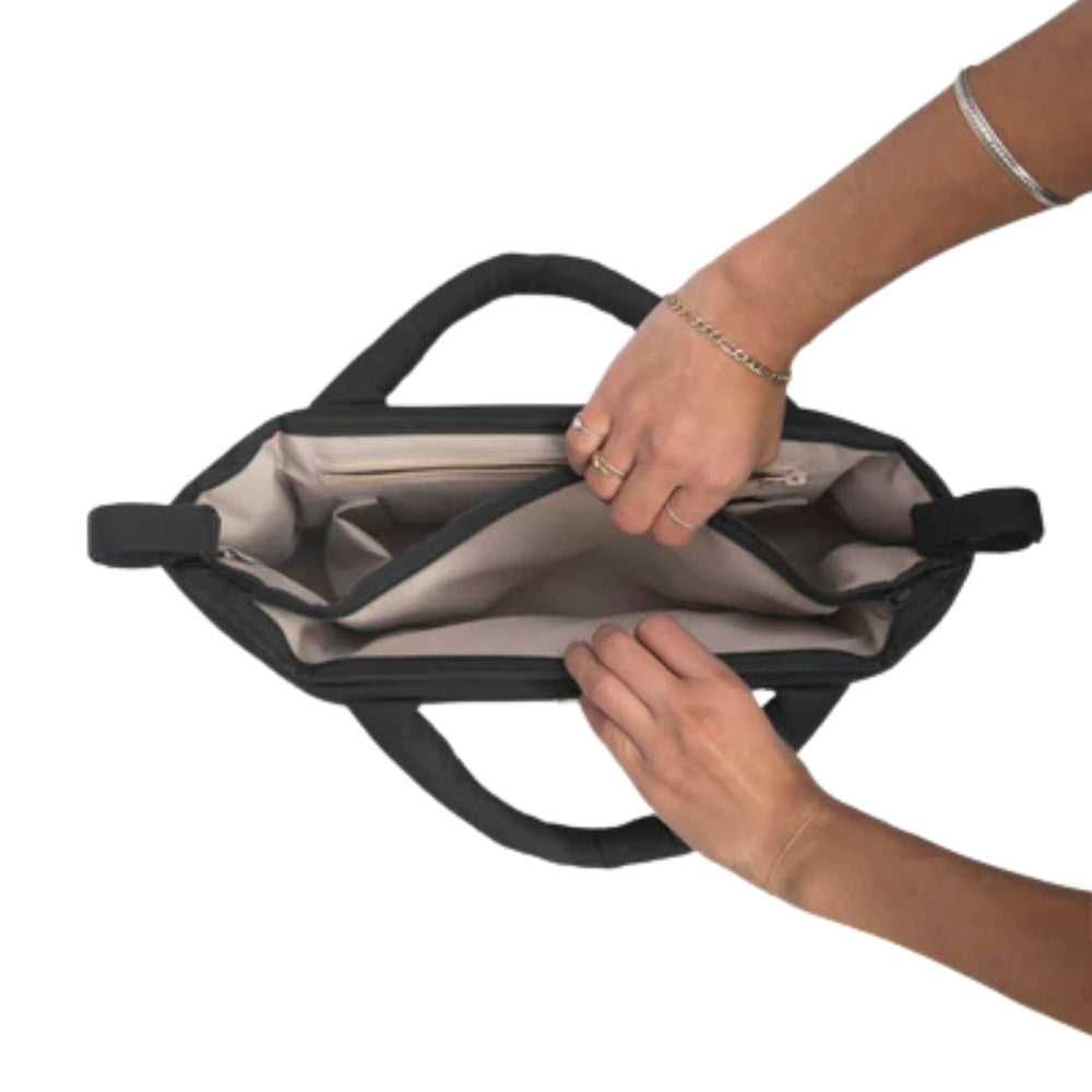 Zippered wallet pocket stores valuables within reach.
