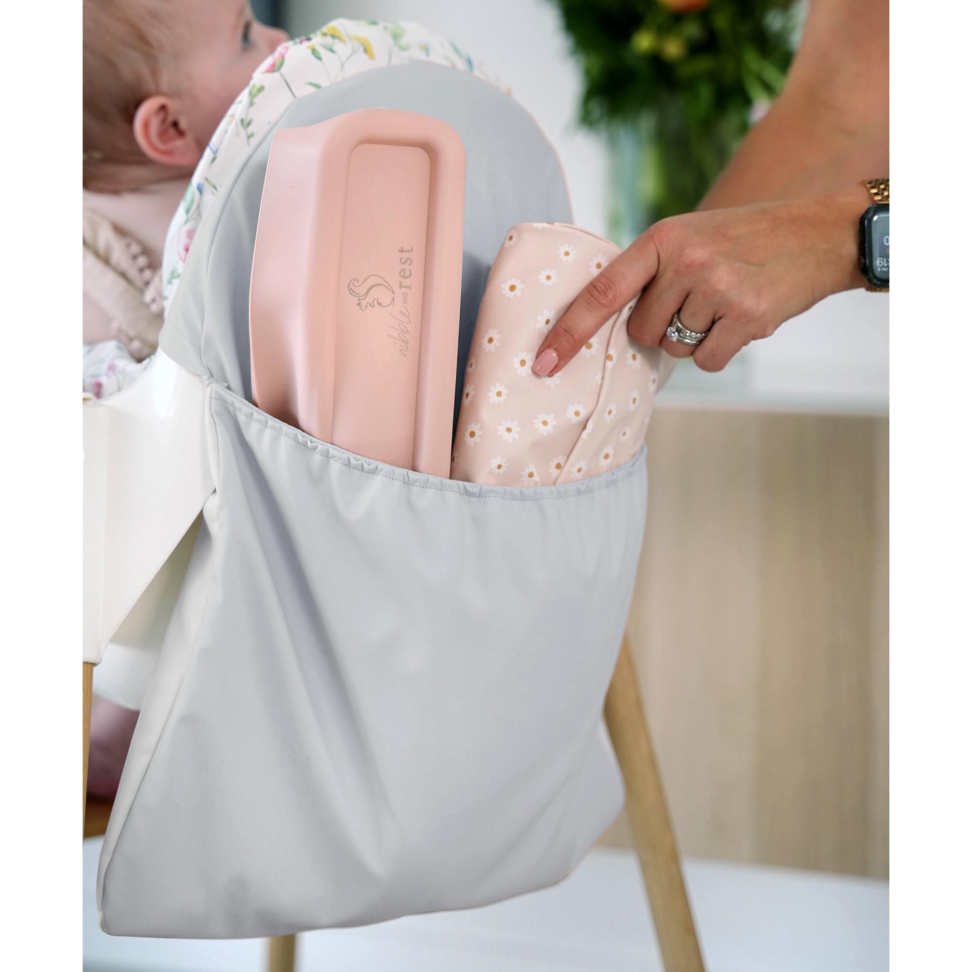 Nibble and Rest Antilop pocket pouch back view for neat highchair storage during meals