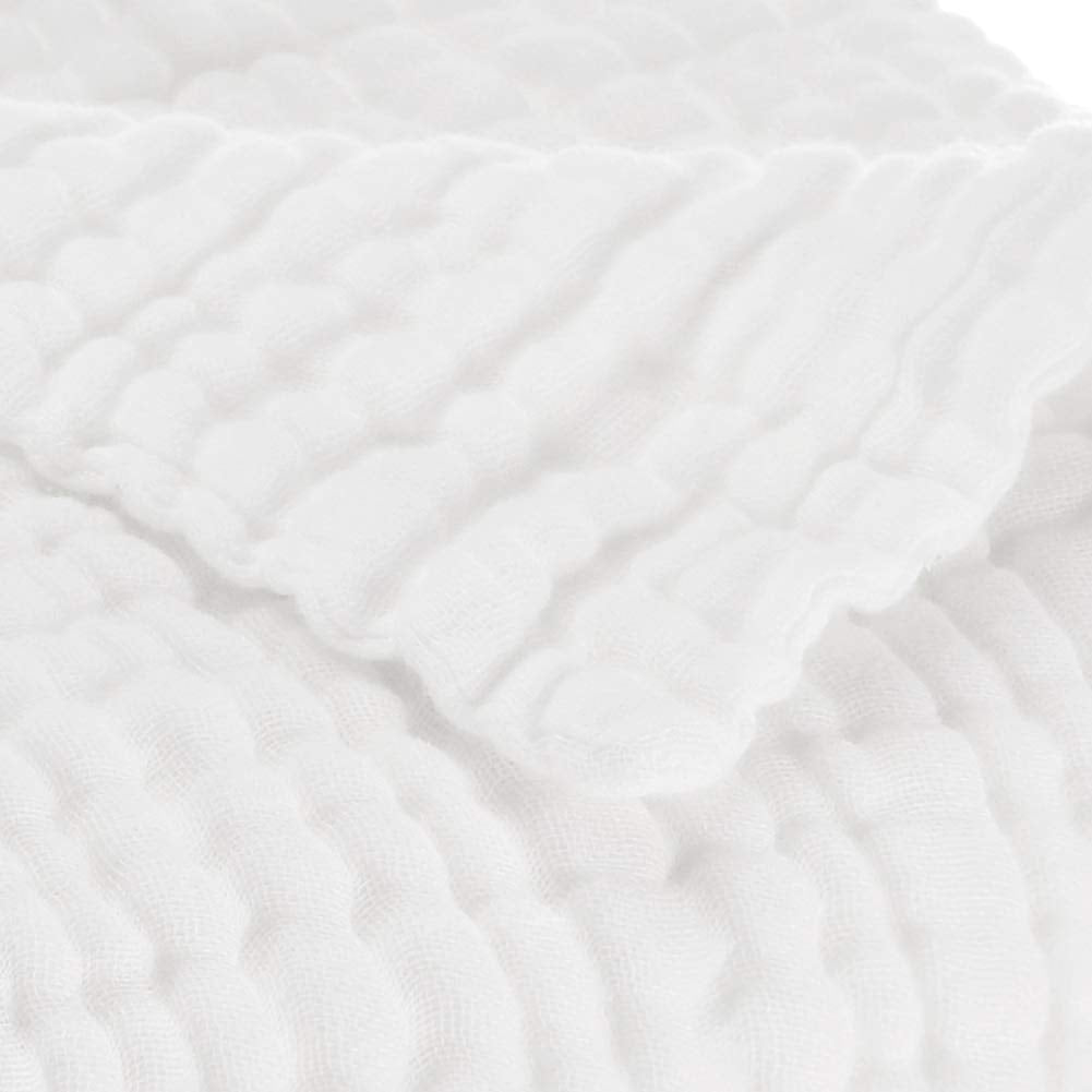 Towel used as a nursing cover, providing lightweight cover and comfort.